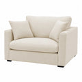 Divano in tessuto beige con cuscini